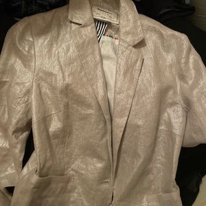 Woman’s gold blazer
